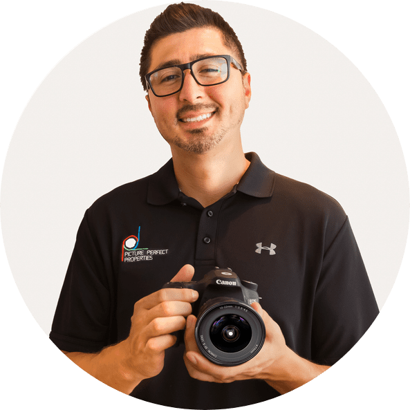 photographer with camera head shot image